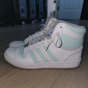 Tiffany blue Adidas high top sneakers